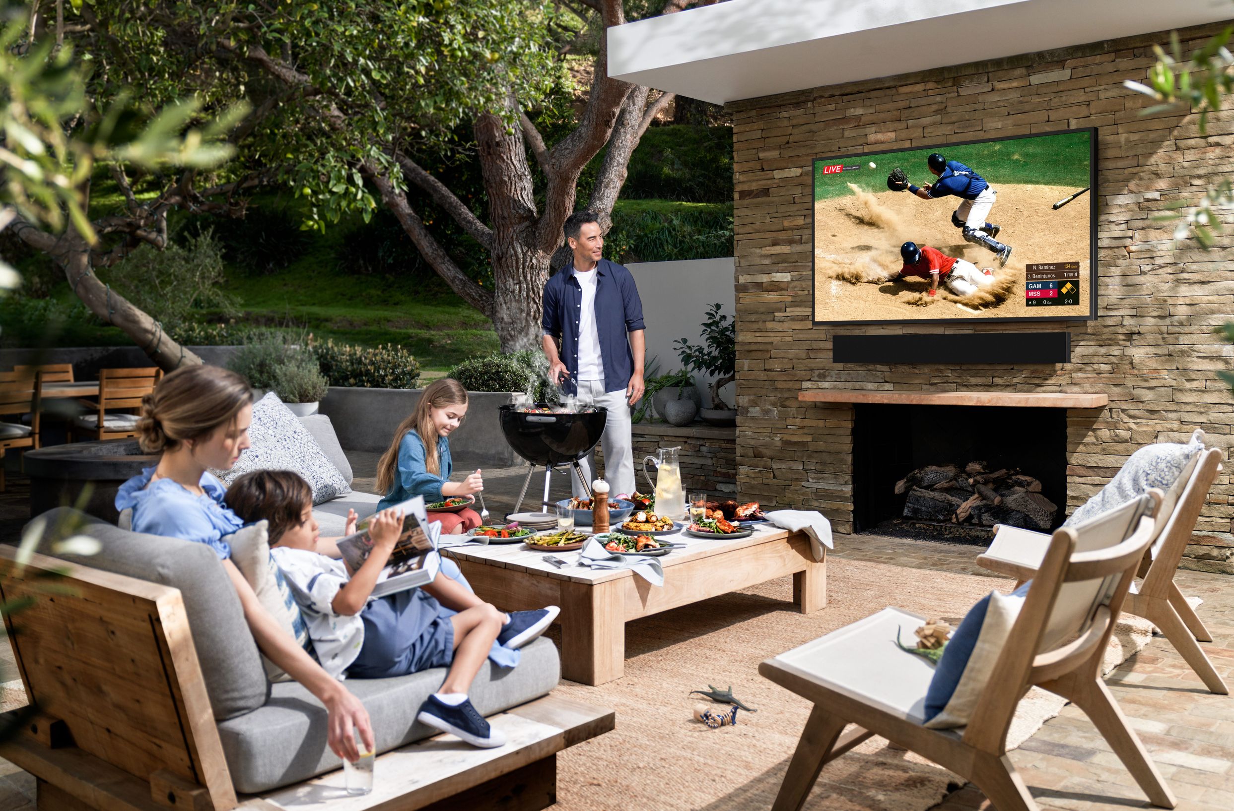 Outdoor entertainment area with fireplace
